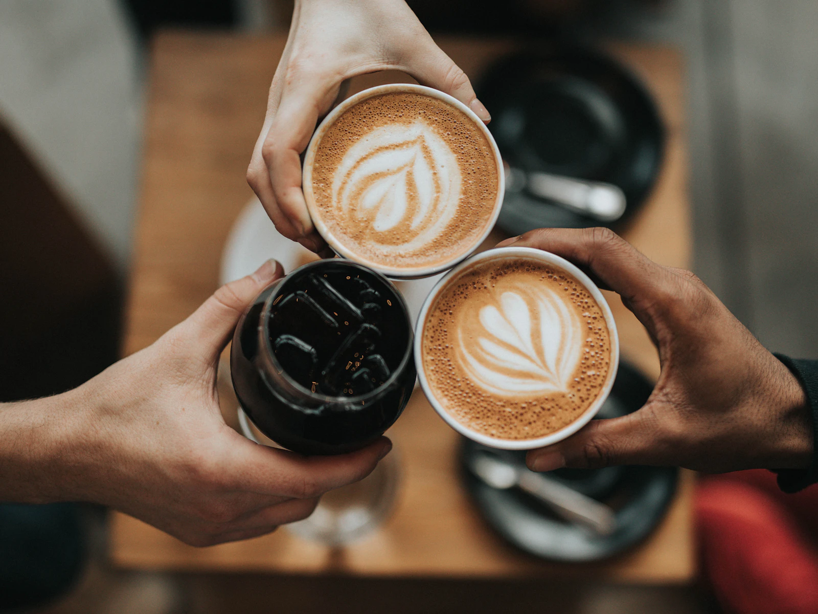 Coffee cup beside a window in soft coastal light